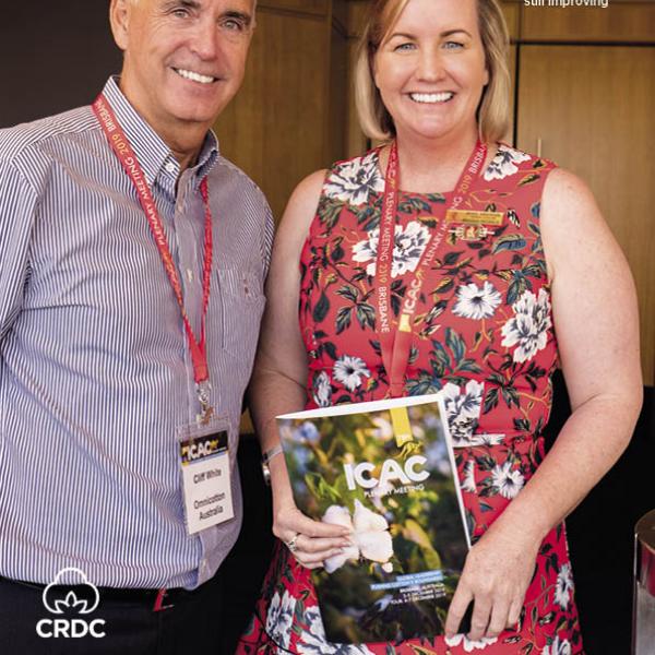 Man and woman smiling on spotlight cover