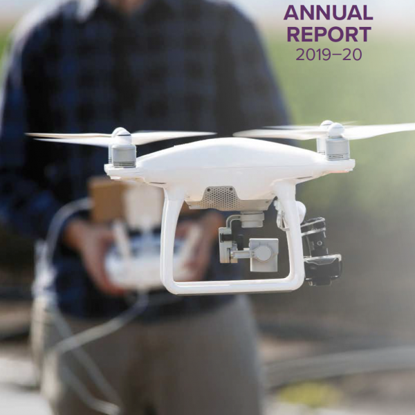 Man behind a white drone