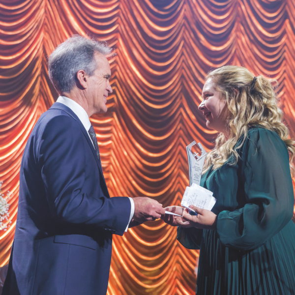 CRDC Chris Lehmann Young Achiever of the Year 2024, Sharna Holman receiving her award from CRDC Executive Director Allan Williams.